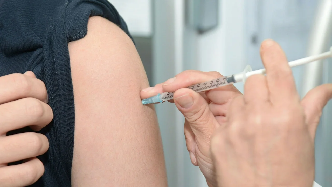 Person receiving needle